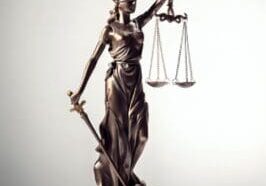 Statue of Lady Justice holding scales.