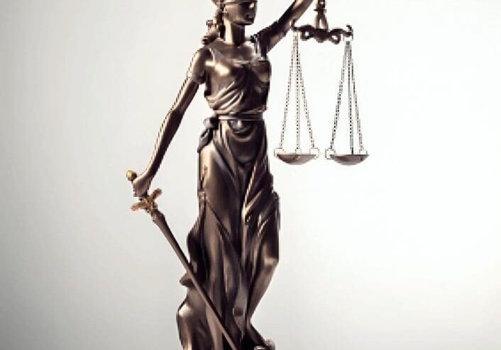 Statue of Lady Justice holding scales.
